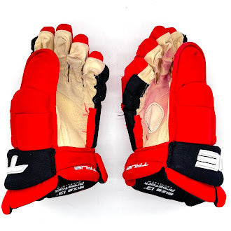True Catalyst 9X - Gant d'occasion Pro Stock de la LNH - Hurricanes de la Caroline (rouge/noir)